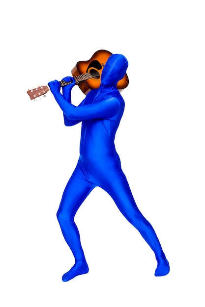 Mysterious blue man in blue suit holding guitar