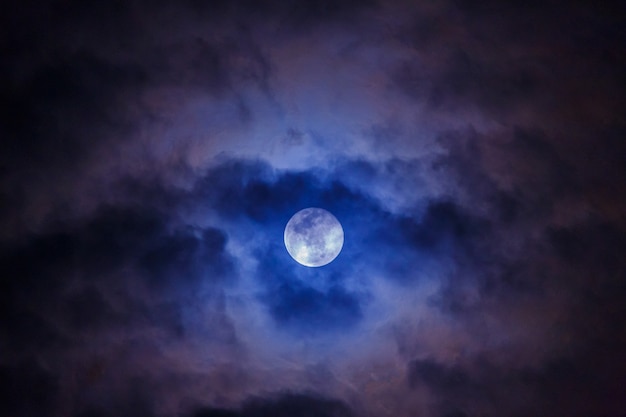 Mysterious dark night sky with full moon and cloud dark space
moon and midnight halloween concept