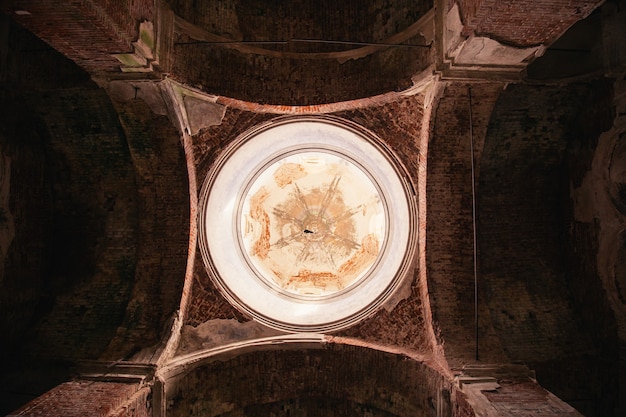 Mysterious mystical interior of an abandoned church, a dark gloomy building, the ruins of a church