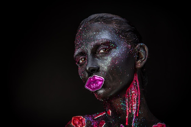 Mystical makeup of a woman in the dark