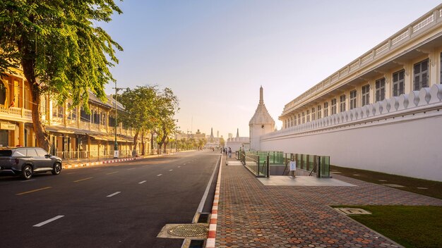 na phra lan road by bangkok grand palace with white walls and traditional architecture