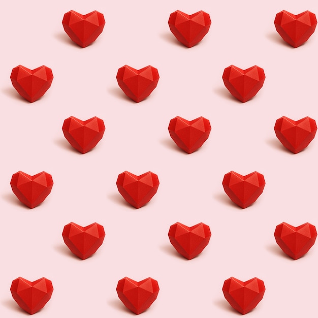 Naadloos patroon met rood veelhoekig document hart