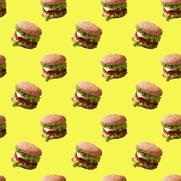 Naadloze patroon hamburger op groene achtergrond