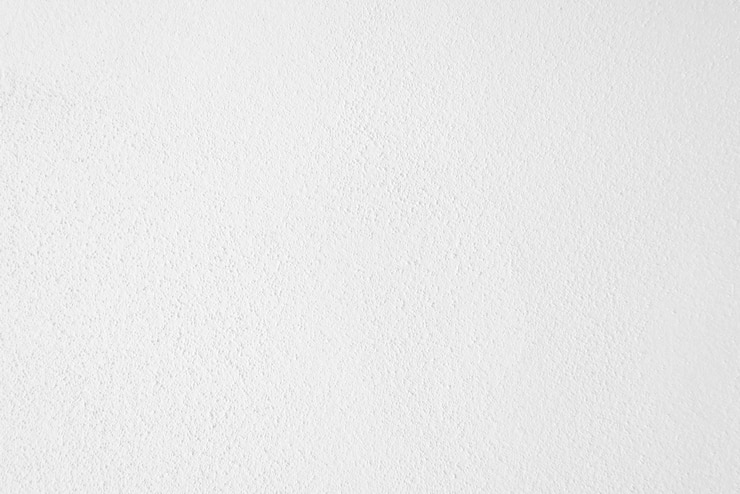 Foto naadloze textuur van witte cementmuur een ruw oppervlak met ruimte voor tekst voor een achtergrond