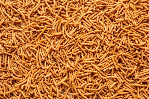 Nachni または Ragi Sev は、シコクビエから作られたカリカリのおいしいヌードルで、ヘルシーなインド料理です。