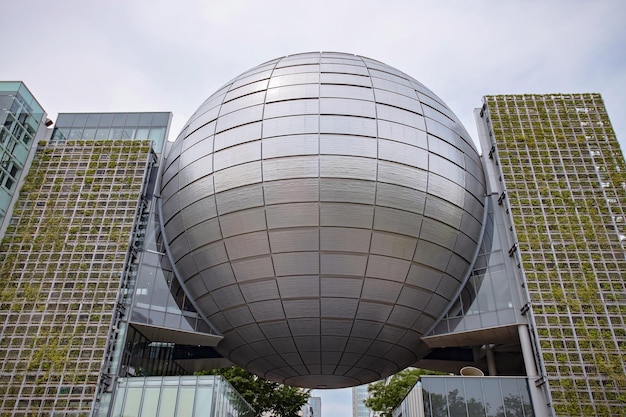 NAGOYA, JAPAN May - 26, 2019: The Nagoya City Science Museum features a characteristic giant silver globe, which houses one of the world's largest planetariums.
