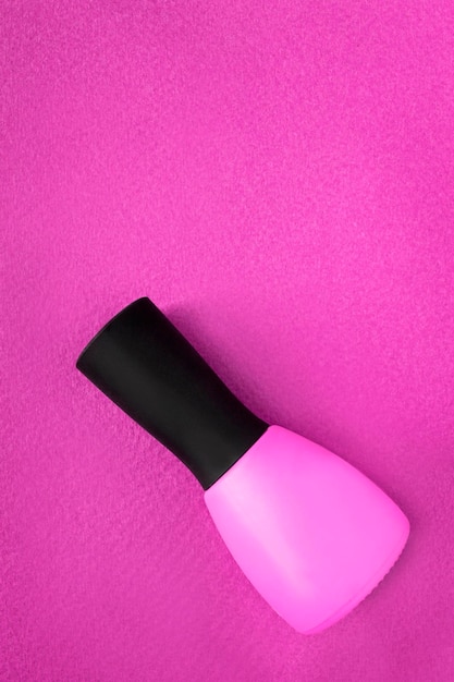 Nail polish on pink background