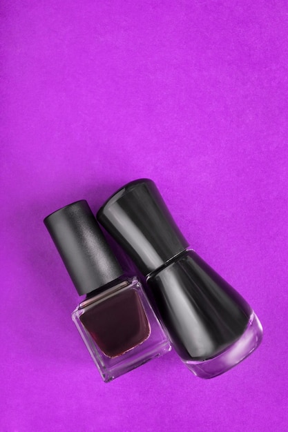 Nail polish on purple background