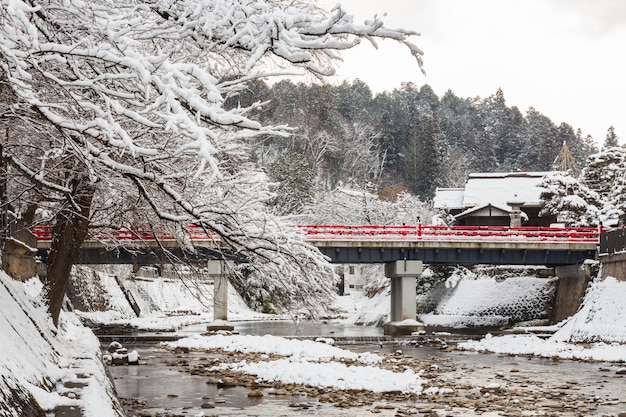 Nakabashi Bridge with snow fall and Miyakawa river in winter season 