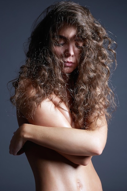 Naked Hairy girl with curly Hairdo