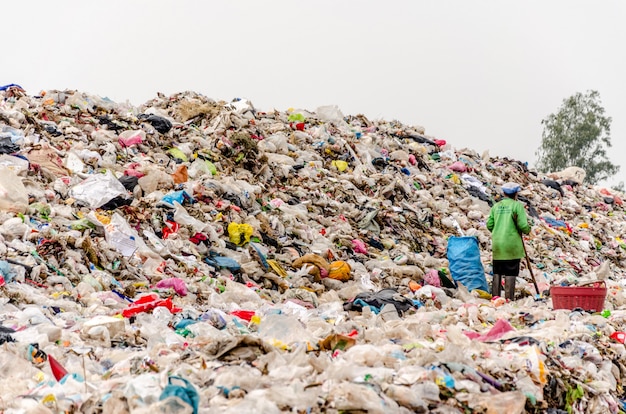 NAKONPANOM, THAILAND - APRIL 22: Municipal waste disposal by open dump procese.  Dump site