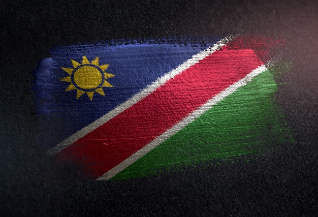 Namibia Flag Made of Metallic Brush Paint on Grunge Dark Wall