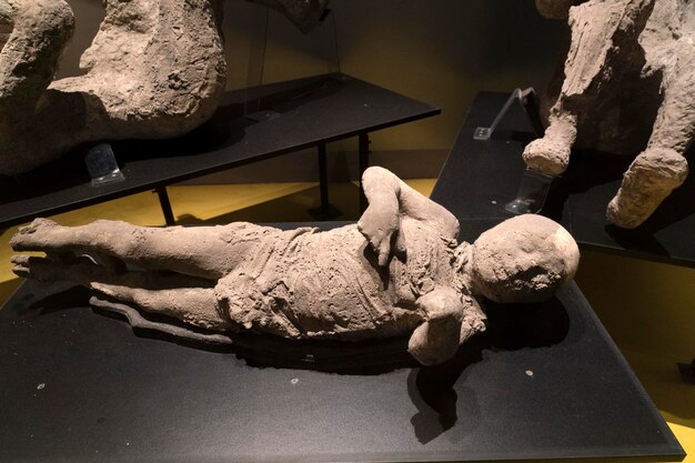 NAPLES, ITALY - FEBRUARY 1 2020 - pompei ruins statue buried corpse