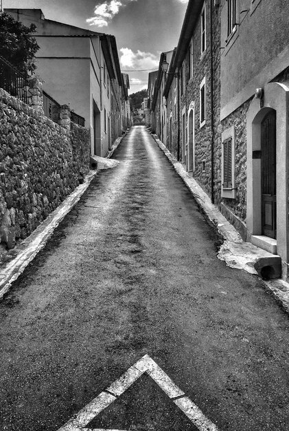 Narrow alley along buildings