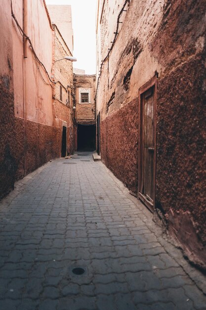 narrow alley along buildings