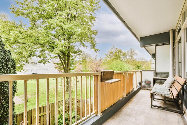 Narrow balcony with chair and door