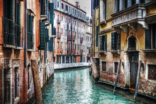 Narrow canal in Venice Italy