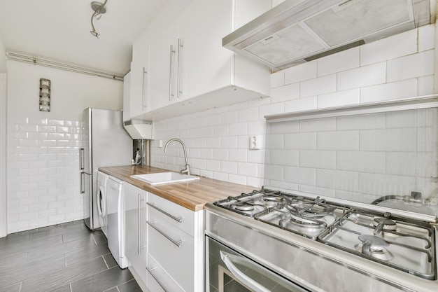 Narrow long kitchen with wood worktop