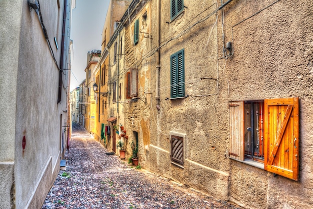 Narrow road in Alghero old town Processed for hdr tone mapping effect