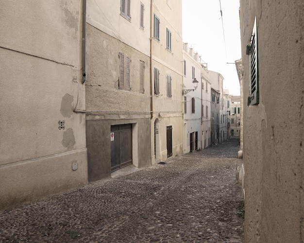 Narrow street in Alghero Italy Processed for vintage tone