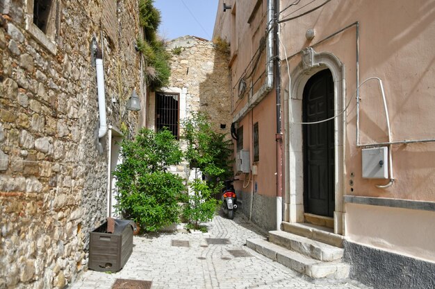 A narrow street in Candela an old town in the Puglia region of Italy