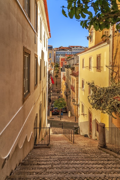 Narrow street of Lisbon district in Portugal