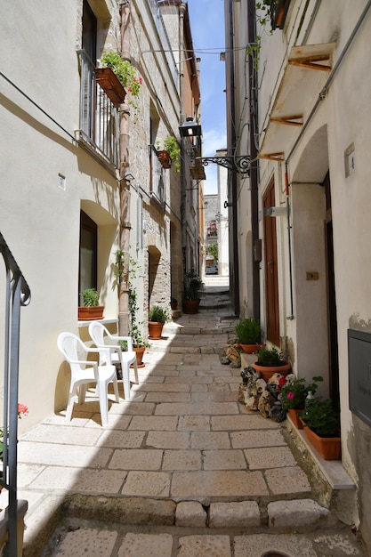 A narrow street among the old houses of irsina in basilicata region in southern italy