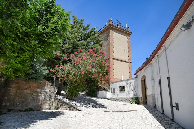 A narrow street between the old houses of Rocchetta SantAntonio a medieval village in Puglia Italy