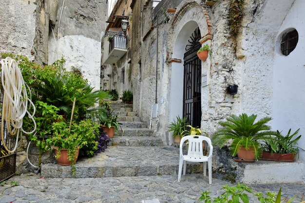 A narrow street between old houses of scalea old village in calabria region italy