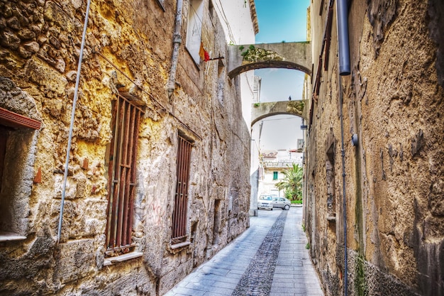 Narrow street in Sassari old town in hdr tone mapping effect