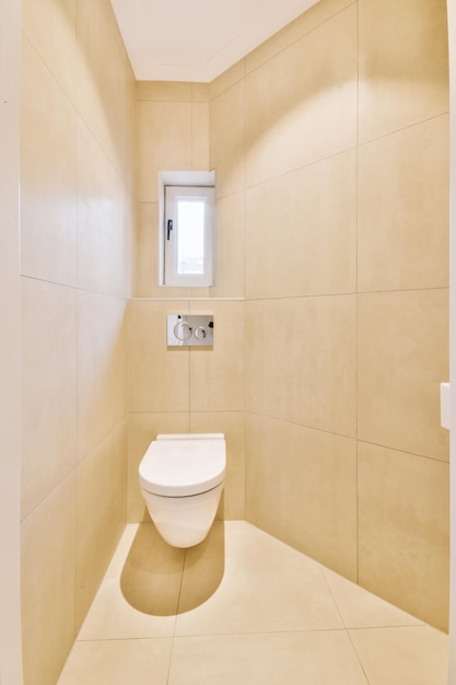 Narrow toilet room with minimalist design