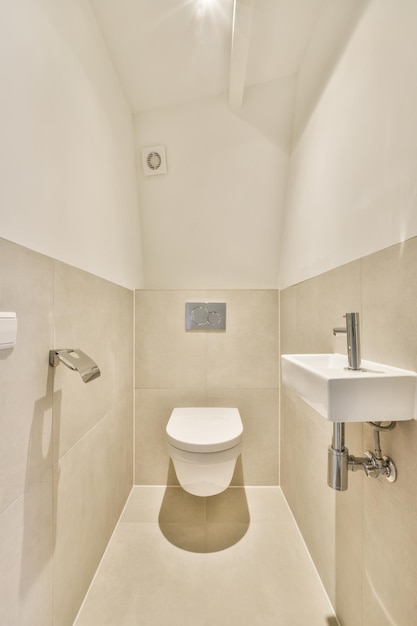 Narrow toilet room with minimalist design