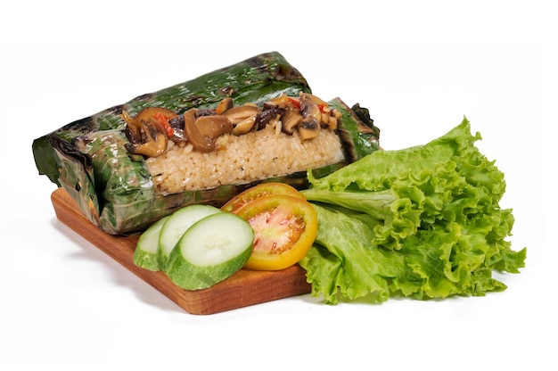 Nasi Bakar jamur or Mushroom Grilled Rice is a Traditional Indonesian Food Wrapped in Banana Leaves