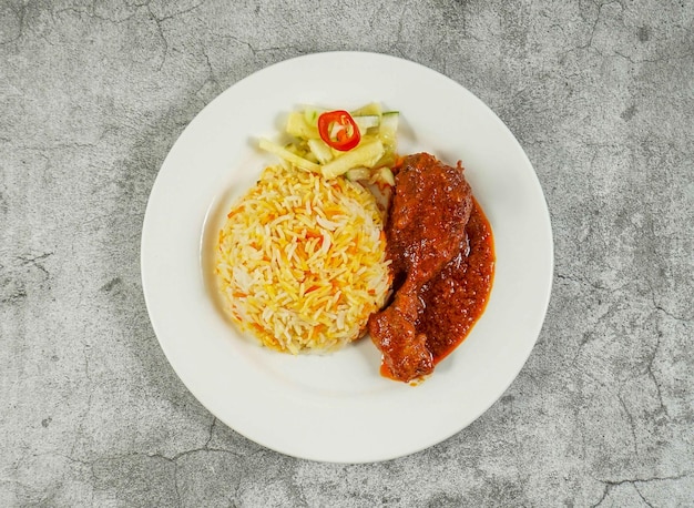 Nasi beriani Beriani Rice with mixed vegetables and fried chicken