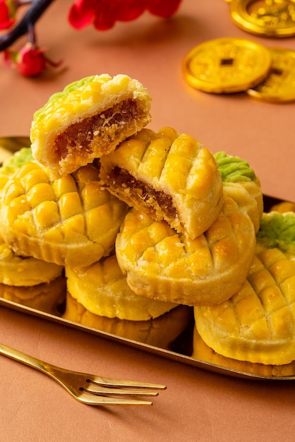 Nastar cookies or Pineapple tart is a small bitesize pastry filled or topped with pineapple jam