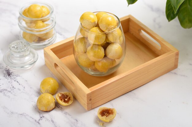 Nastar or indonesian pineapple tart cookies in glass jarvery popular for serving to celebrate ied