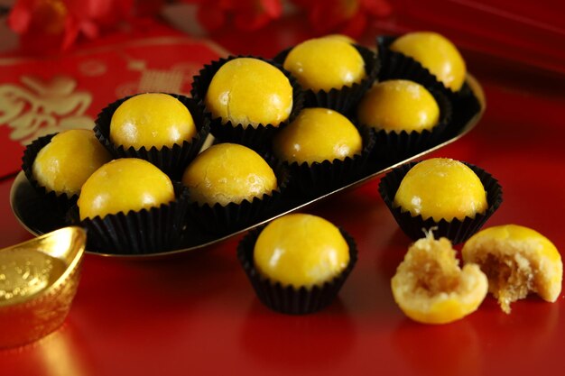 Nastar or Indonesian pineapple tart cookies in white plate.