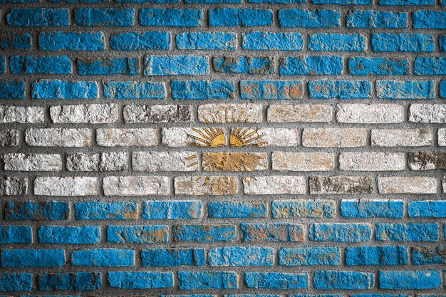 National flag of Argentina
 on an old brick wall