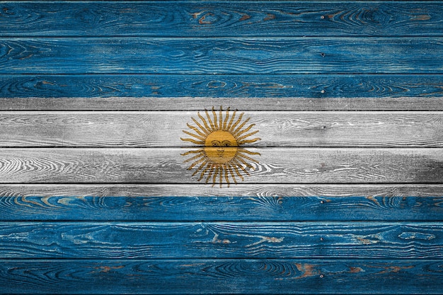 The national flag of ArgentinaxA is painted on a camp of even boards nailed with a nail The symbol of the country