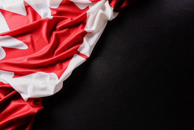 National flag of Canada, beautiful color with cloth texture.