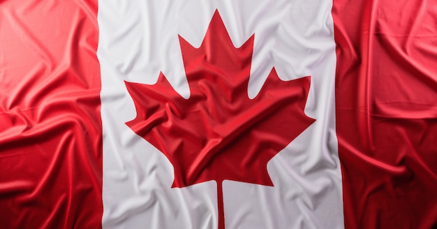 National flag of Canada with cloth texture, close up.