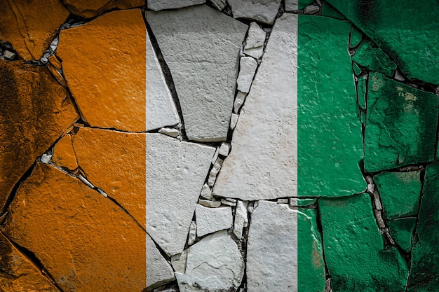 National flag of Cote d'ivoire
 on an old stone wall