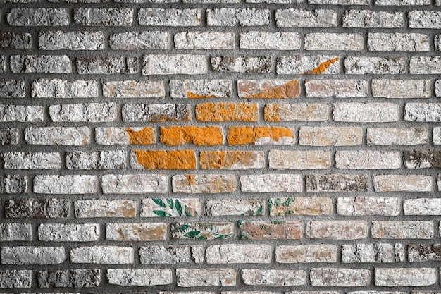 National flag of Cyprus on an old brick wall