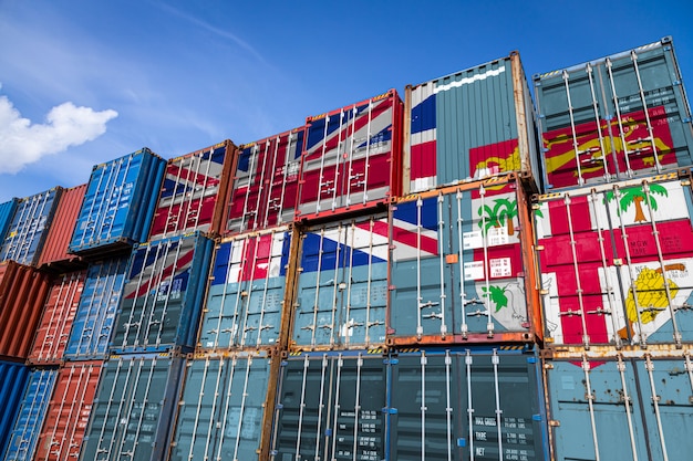 national flag of Fiji on a large number of metal containers for storing goods stacked in rows