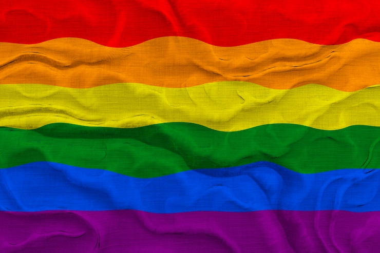 Photo national flag of gay pride background with flag of gay pride