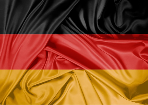 Photo national flag of germany hoisted outdoors germany day celebration 3d rendering