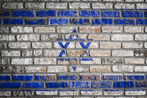 National flag of Israel
 on an old brick wall