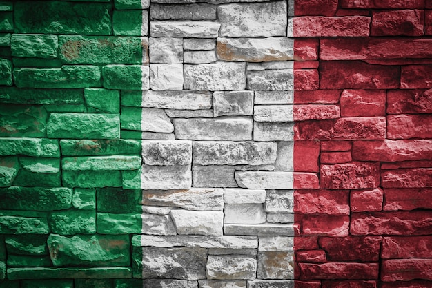 National flag of Italy on stone  wall background