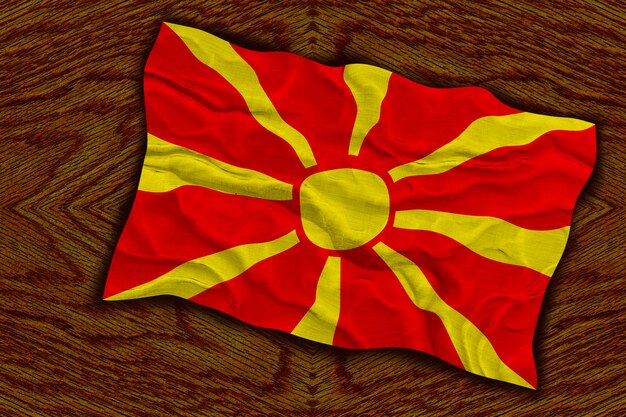 Foto bandiera nazionale della macedonia sfondo con bandiera della macedonia