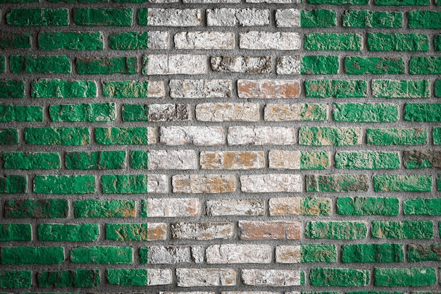 National flag of Nigeria
 on an old brick wall